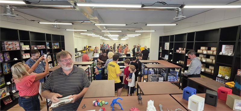 Visitors filling the PHYSICS store on opening day